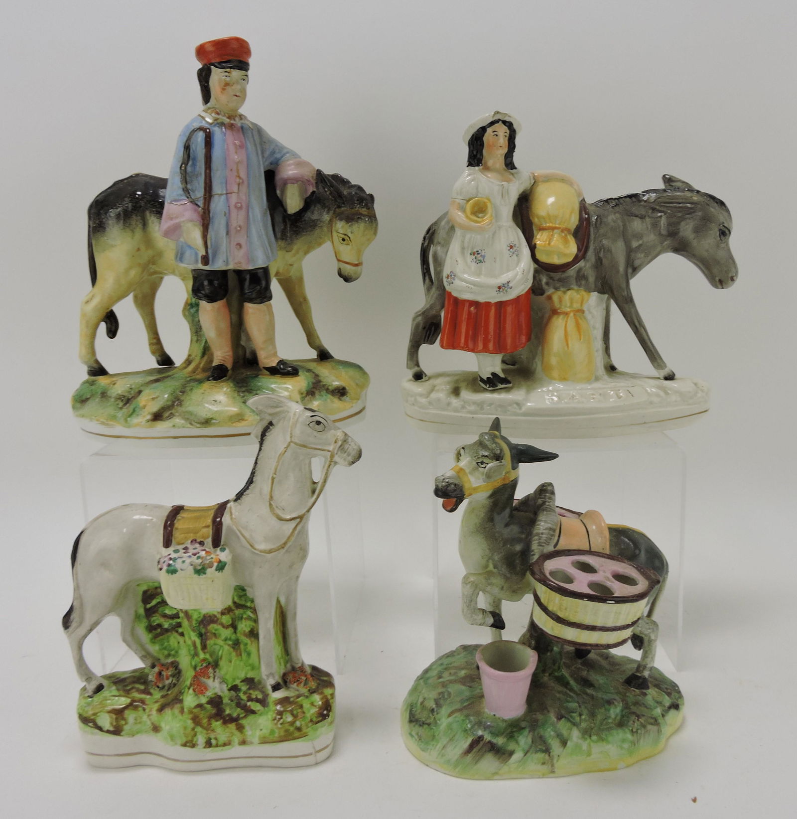 Staffordshire lot of 4 donkey figures, (1 of 1)