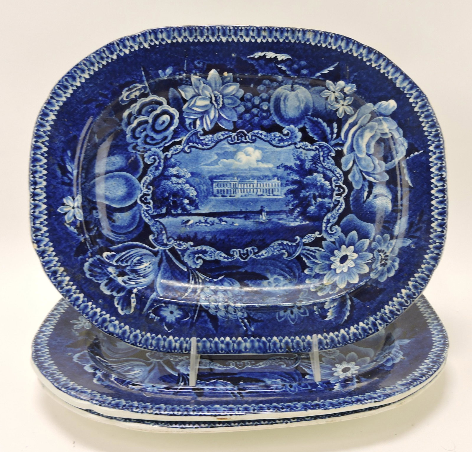 Staffordshire transferware blue and: white lot of 3 platters, 13"x10", 'Hall's Boughton House', rim chip to one, hairline to one, and nick to one