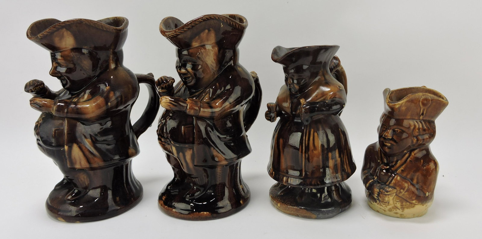 Bennington Rockingham lot of 4: toby jugs, 6 to 9 1/2", various condition