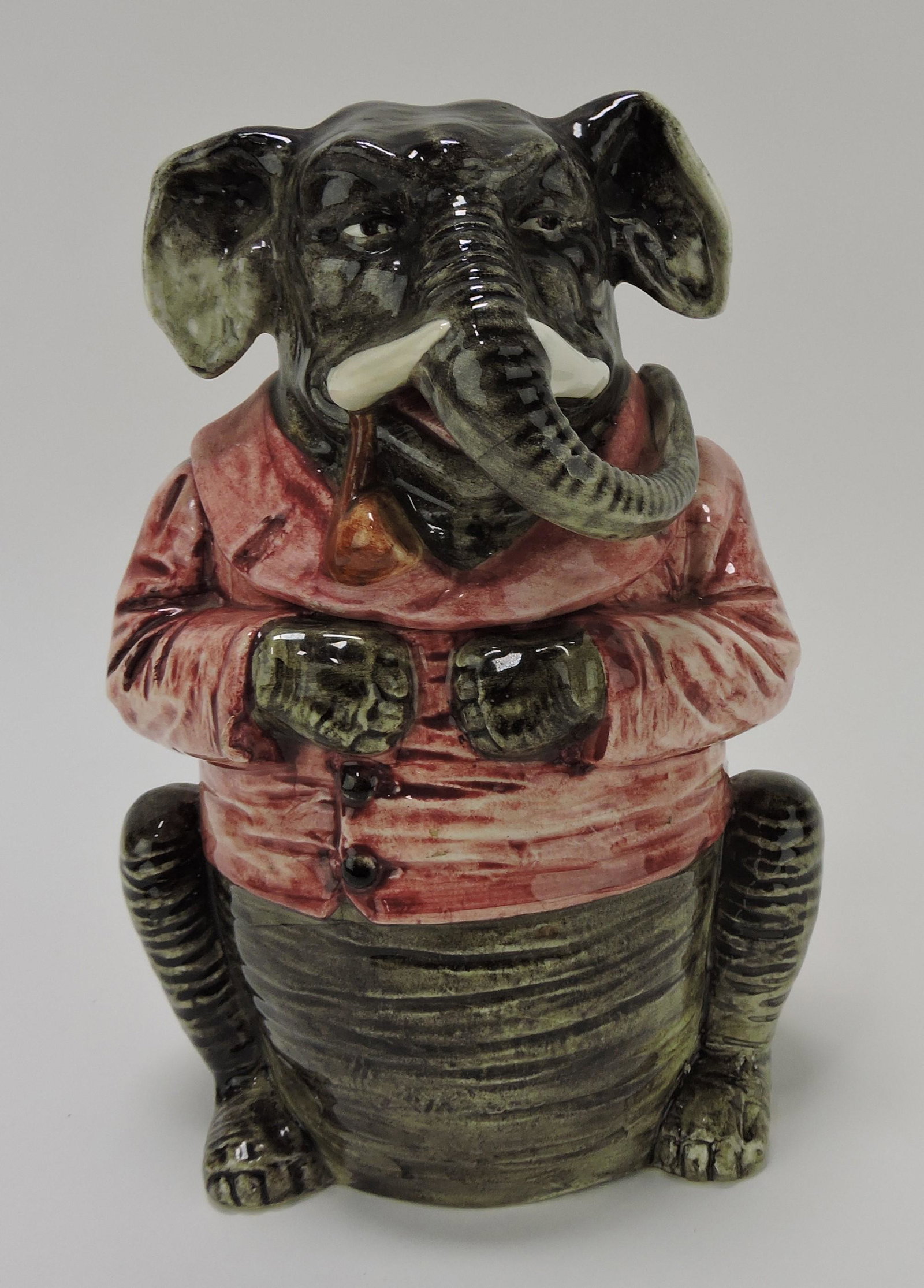 Majolica elephant with red smoking (1 of 1)