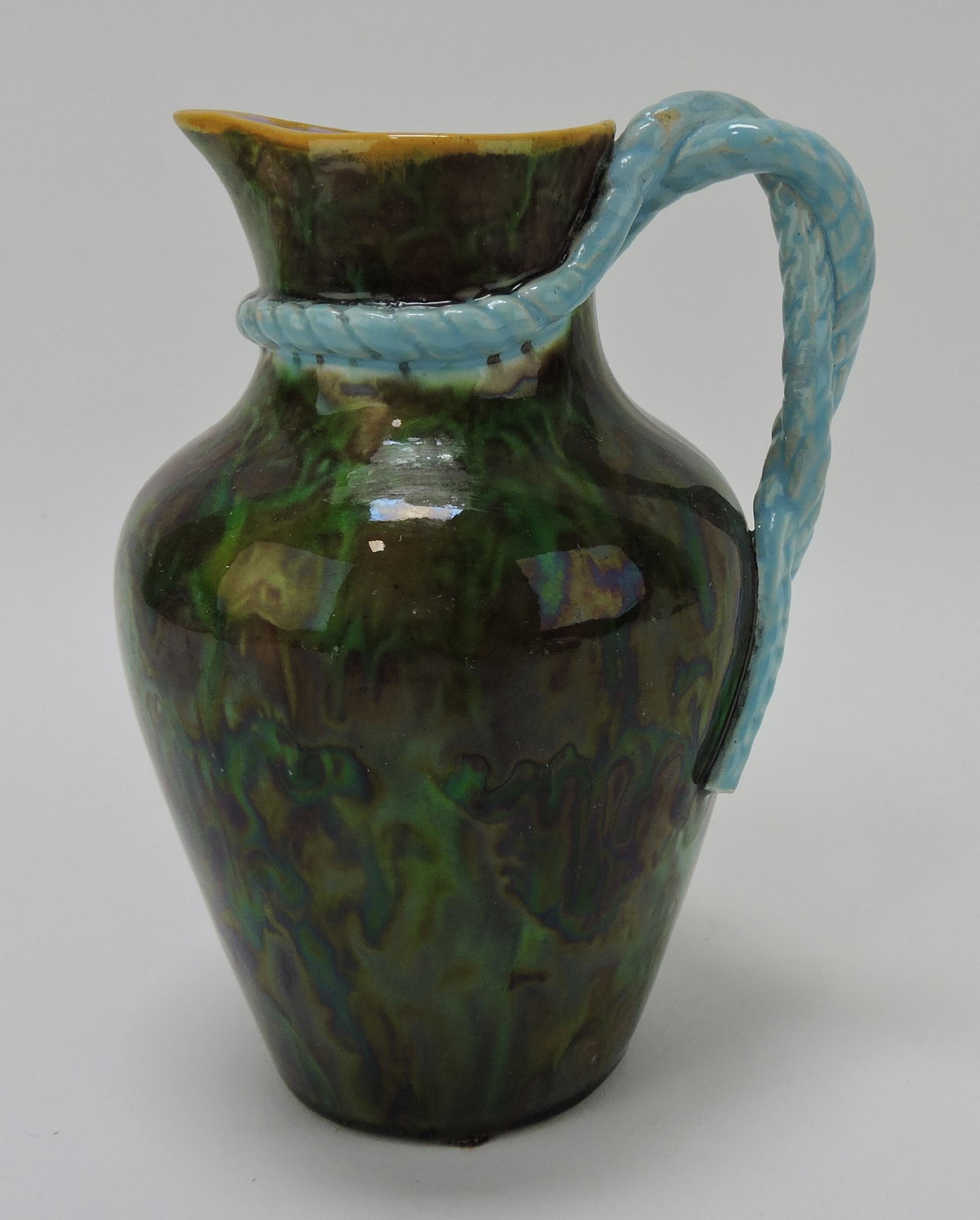 George Jones majolica mottled pitcher: with turquoise rope handle, 6", professional spout repair