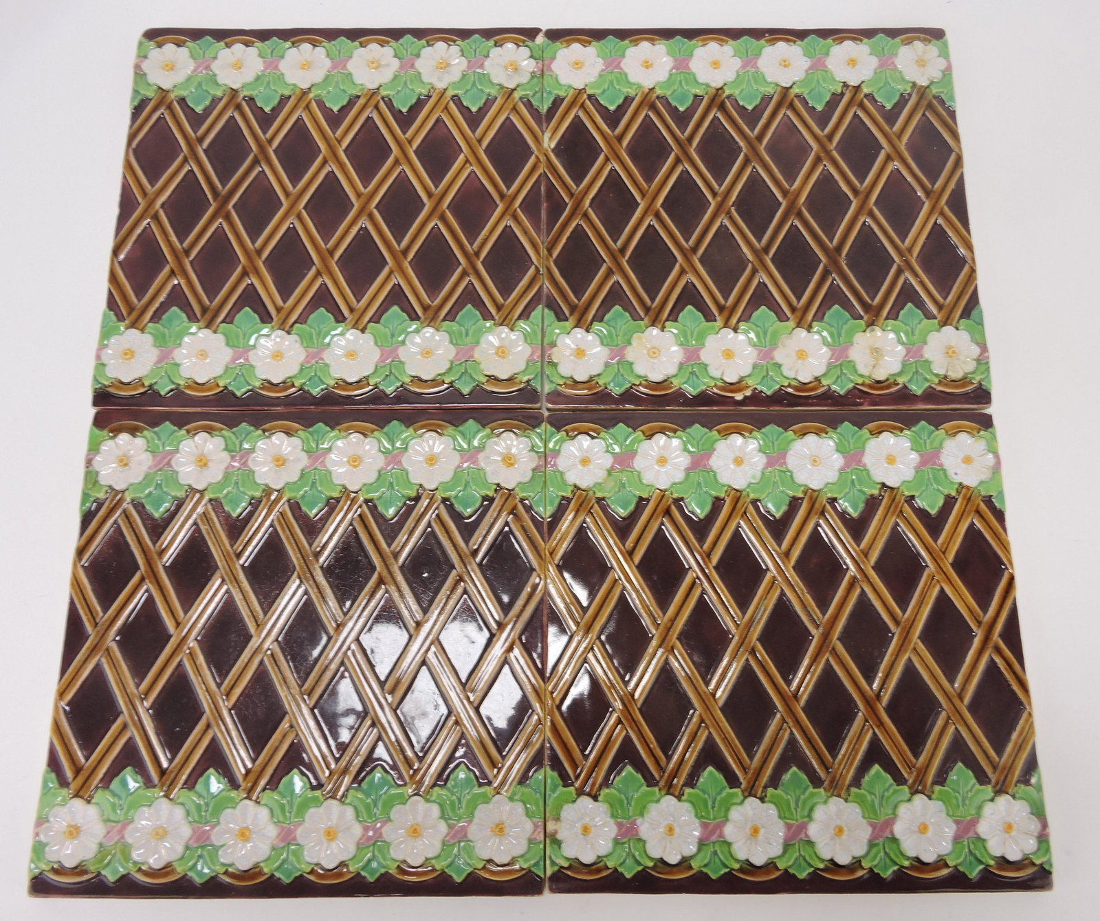 Minton majolica lot of 4 - 8" tiles with: flowers and lattice