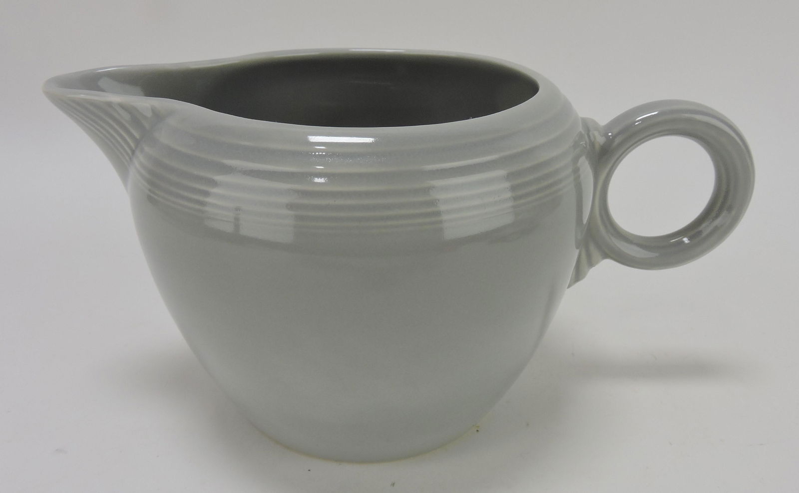 Fiesta two pint jug, gray, rim nick: .