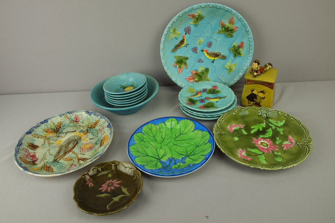 Majolica lot of 17 pieces including 5 piece bird d: Majolica lot of 17 pieces including 5 piece bird dessert set, 7 piece fruit bowl set, humidor and 4 plates and bowls, various condition