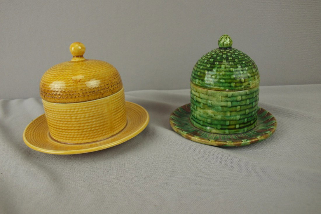 Majolica lot of 2 bee hive covered honey dishes, o: Majolica lot of 2 bee hive covered honey dishes, one marked Sarreguemines, chip to rim of one