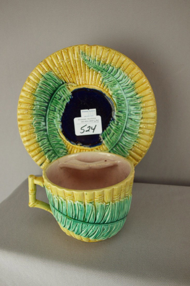 Wardle majolica bamboo and fern mustache cup and s: Wardle majolica bamboo and fern mustache cup and saucer, rim chip to saucer