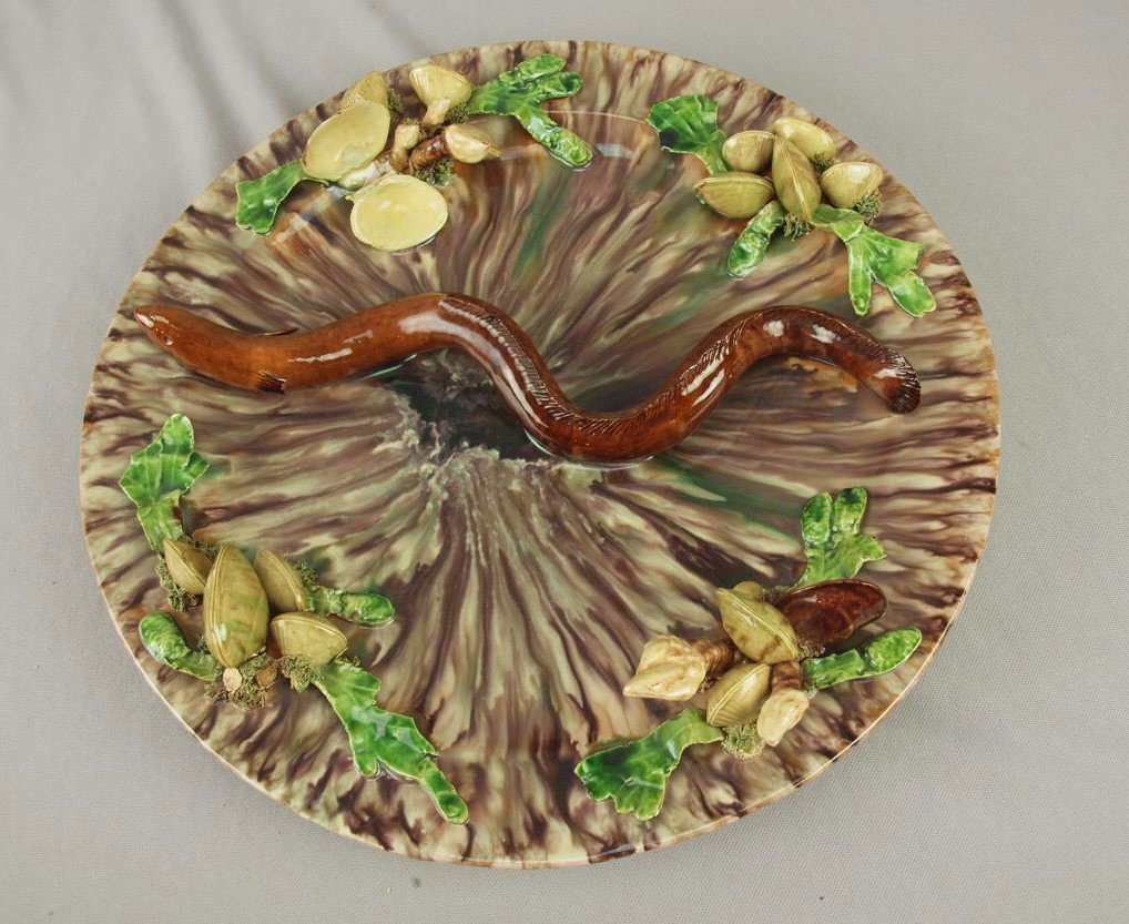 Francisco Gomes de Avelar Portugal Palissy Ware ma: Francisco Gomes de Avelar Portugal Palissy Ware majolica round tray with eel, shells and coral, loss of a piece of coral, 15 1/4"d