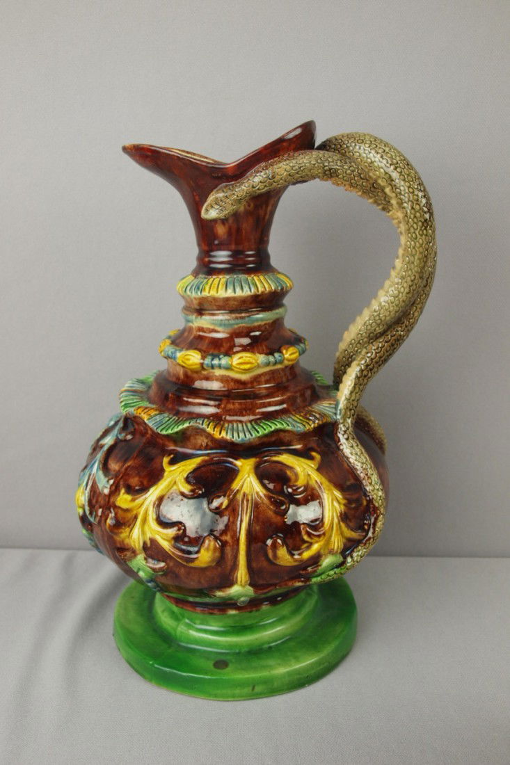 Portugal Palissy Ware majolica jug with snake hand: Portugal Palissy Ware majolica jug with snake handle, 12 1/2" , professional spout and base rim repair