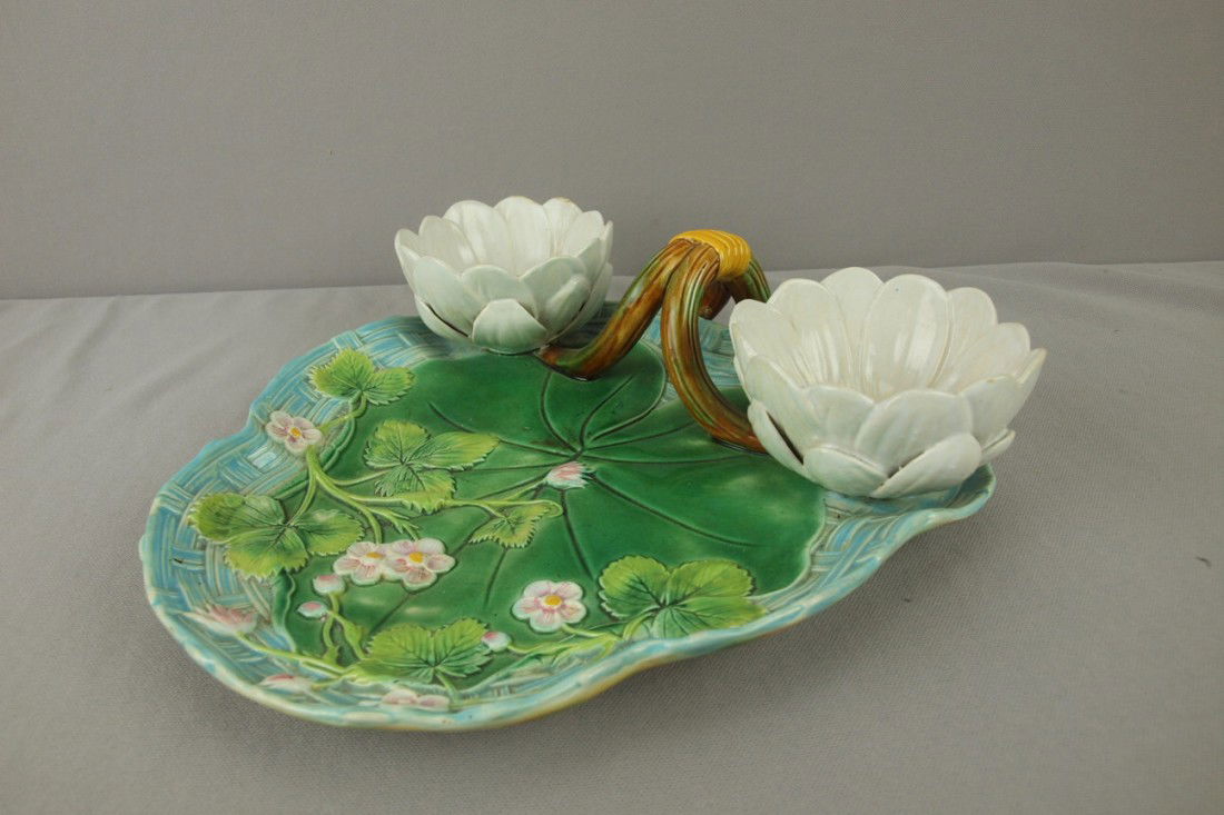 GEORGE JONES strawberry server in the form of a tu: GEORGE JONES strawberry server in the form of a turquoise basket with leaves and flowers and water lily cup sugar and creamer with vine handle, 11"w