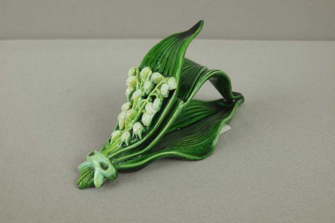 GEORGE JONES majolica rare lily of the valley napk: GEORGE JONES majolica rare lily of the valley napkin ring , professional repair to tips of leaves, 5 3/4"l