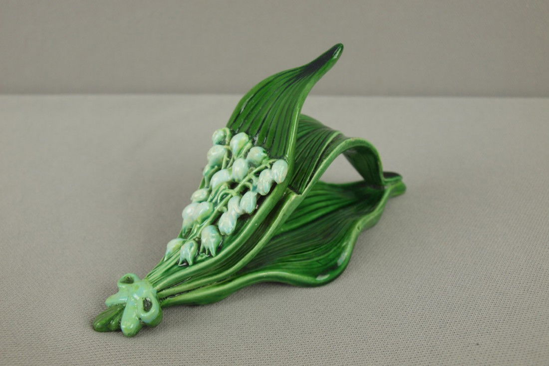 GEORGE JONES majolica rare lily of the valley napk: GEORGE JONES majolica rare lily of the valley napkin ring , professional repair to tips of leaves, 5 3/4"l