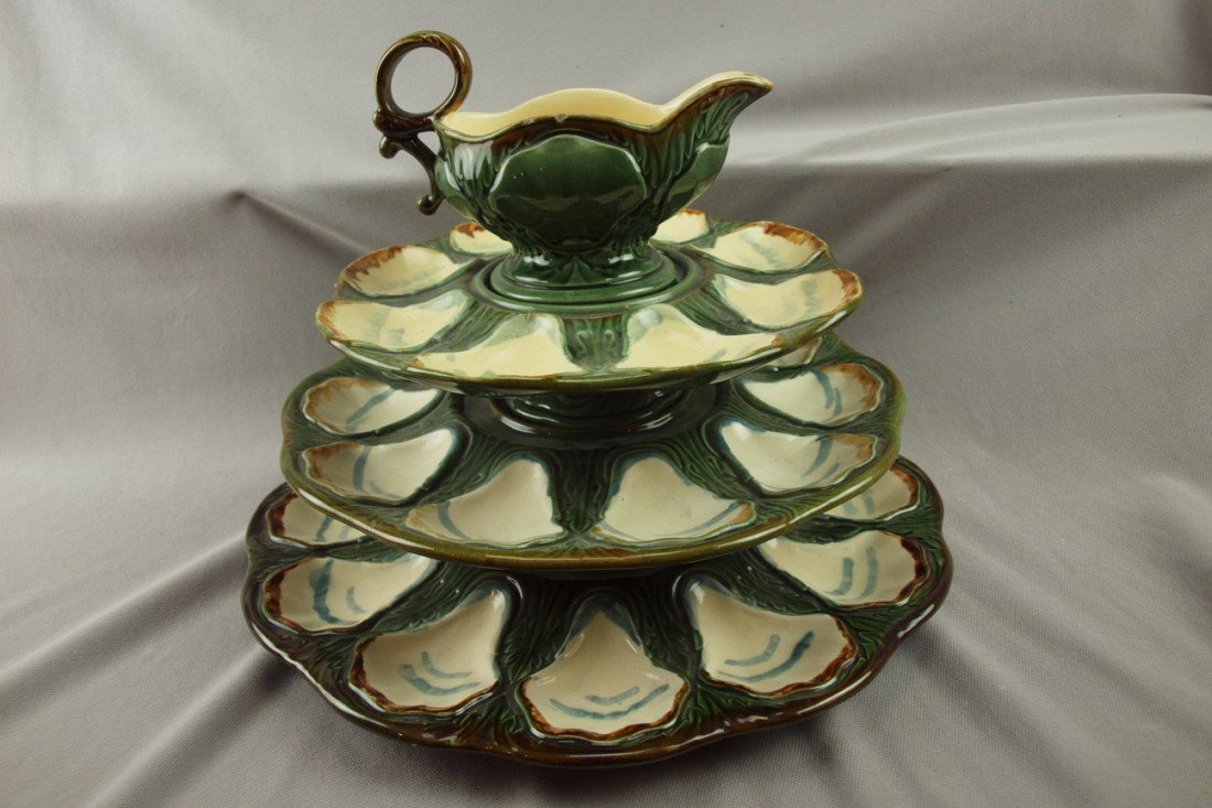 Longchamp French majolica 4 piece tiered oyster s: Longchamp French majolica 4 piece tiered oyster server with creamer, chip to base rim of creamer, 13"d, 10 1/2"h