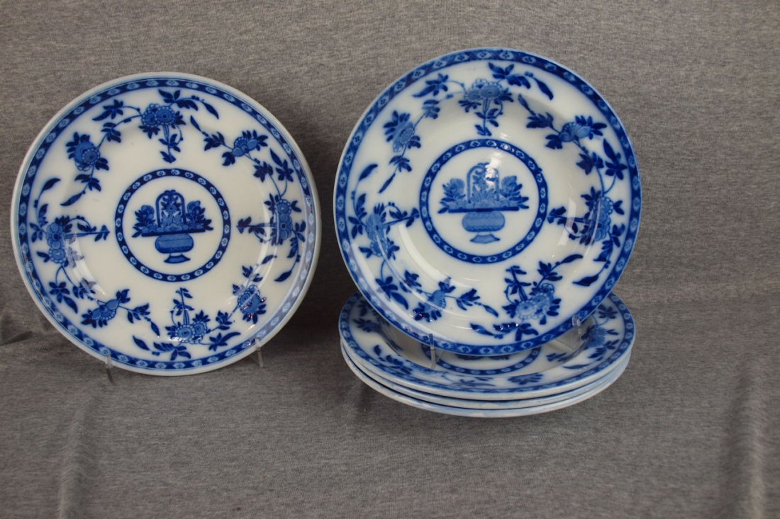 Minton flow blue set of 4-9 1/2" flat rim soup bow: Minton flow blue set of 4-9 1/2" flat rim soup bowls and 1- 10 1/2" plate (chip)