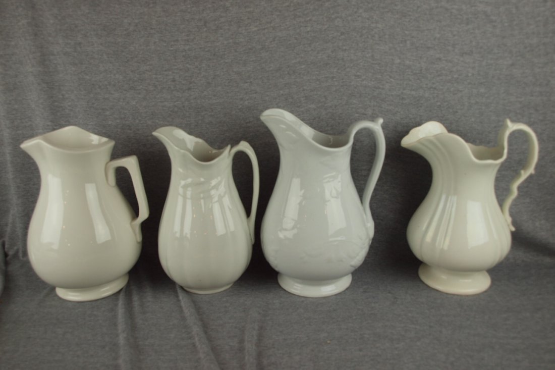 Lot of 4 white ironstone pitchers, 11" average : Lot of 4 white ironstone pitchers, 11" average