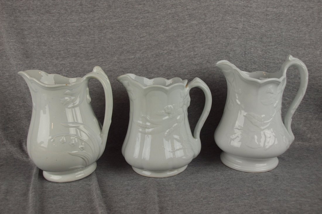 Lot of 3 white ironstone pitchers, 8 1/2" average: Lot of 3 white ironstone pitchers, 8 1/2" average