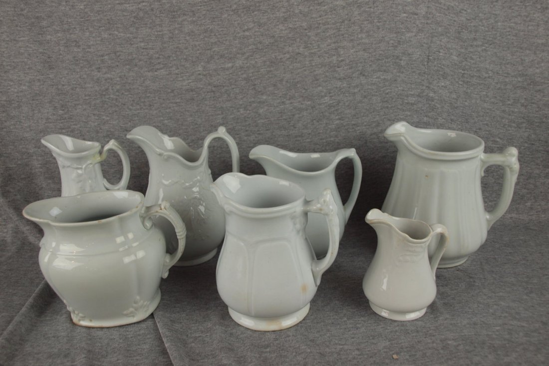 Lot of 7 white ironstone pitchers, 5 1/2" average: Lot of 7 white ironstone pitchers, 5 1/2" average