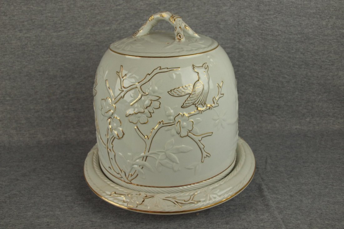 White ironstone cheese keeper with bird on branch : White ironstone cheese keeper with bird on branch and gold accent, 11 1/2"d, 11 1/2"h