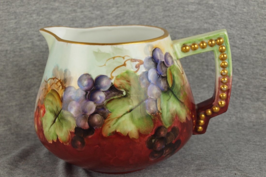 Bavarian hand painted porcelain pitcher with grape: Bavarian hand painted porcelain pitcher with grape motif, 6", artist signed