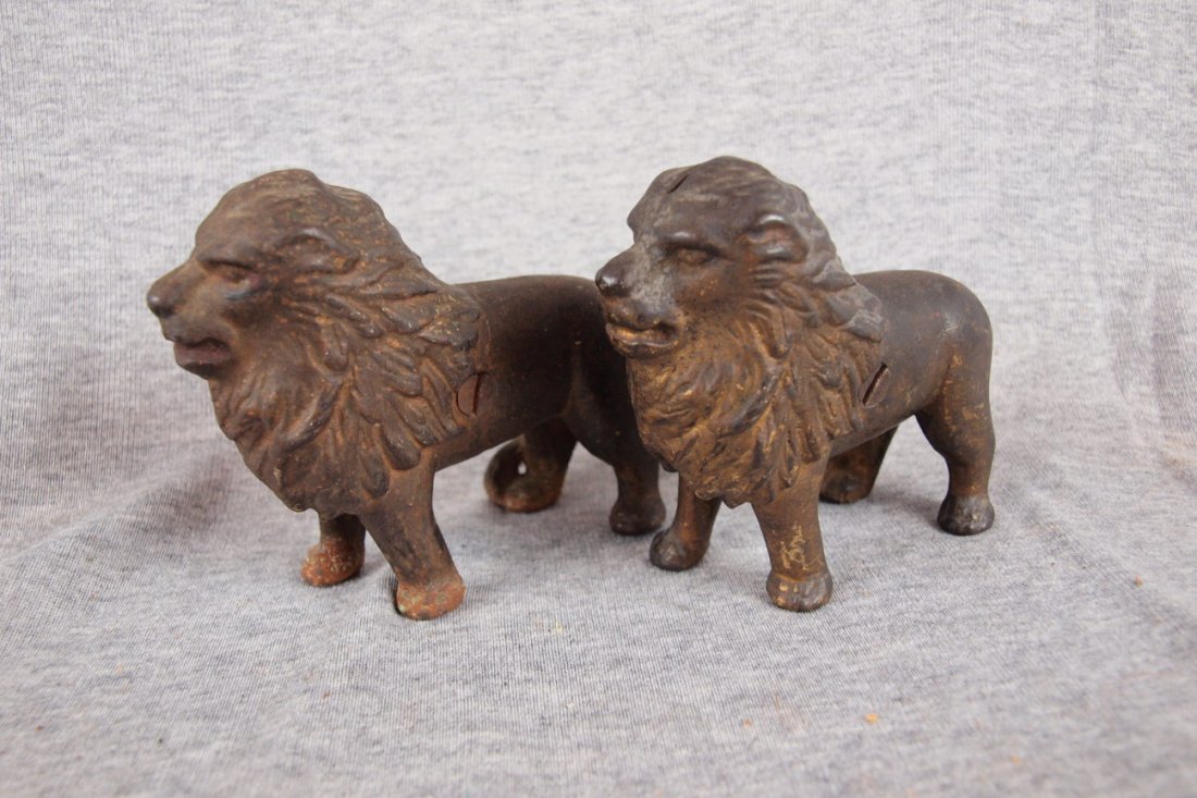 2 Cast iron lion still banks: 2 Cast iron lion still banks