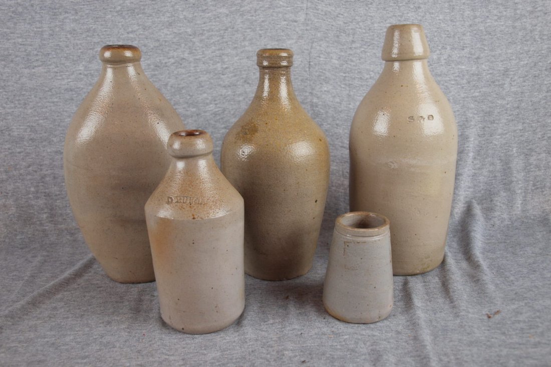 Lot of 4 salt glaze bottles and one jar, 2 signed: Lot of 4 salt glaze bottles and one jar, 2 signed