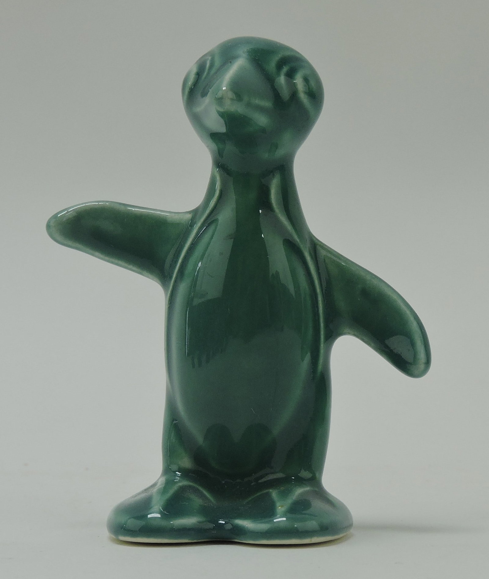 Harlequin animal, penguin, spruce green: .
