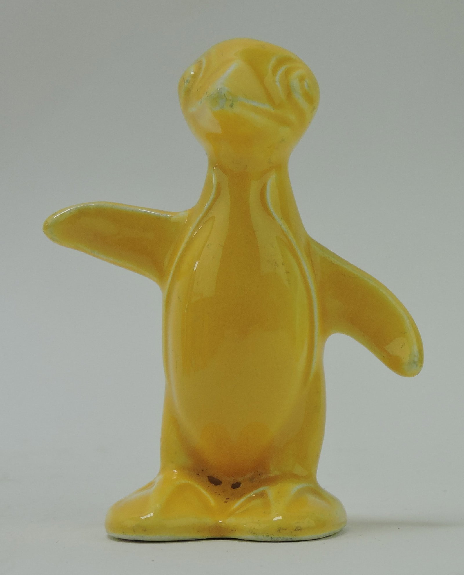 Harlequin animal, penguin, yellow: .
