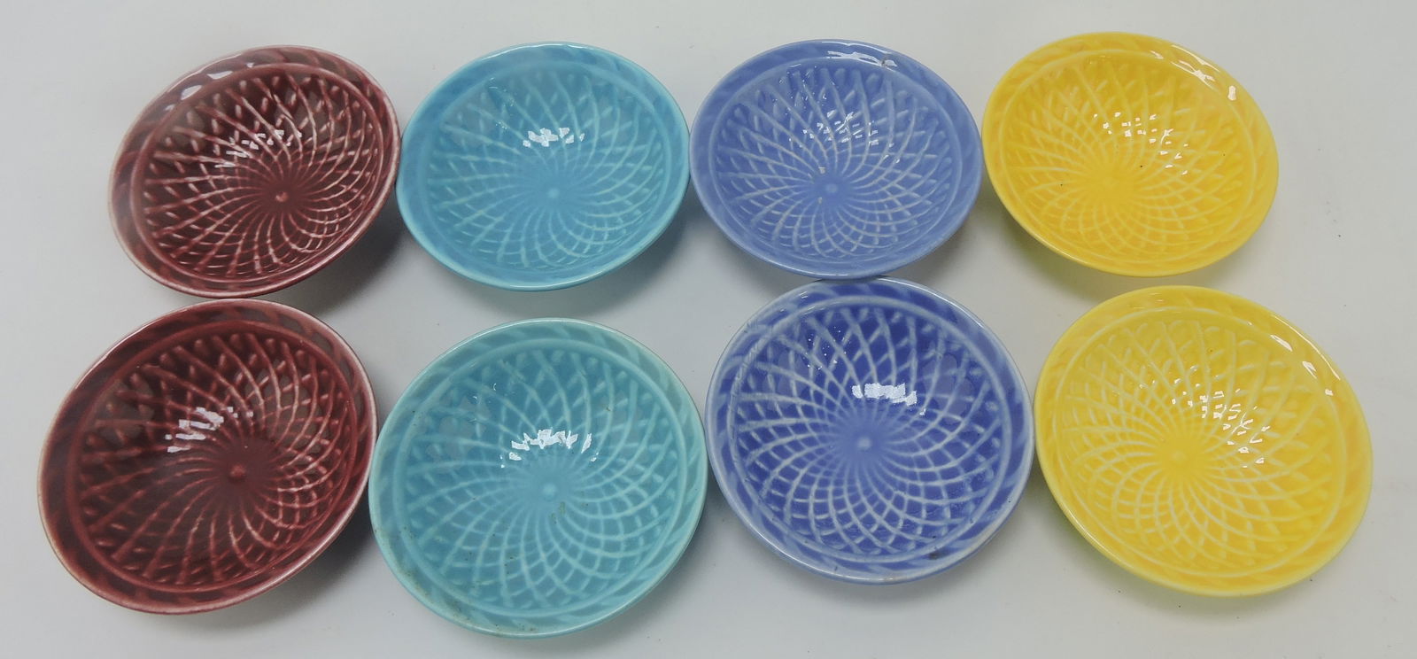 Harlequin nut cup group: 2 each maroon,: turquoise, mauve blue, yellow