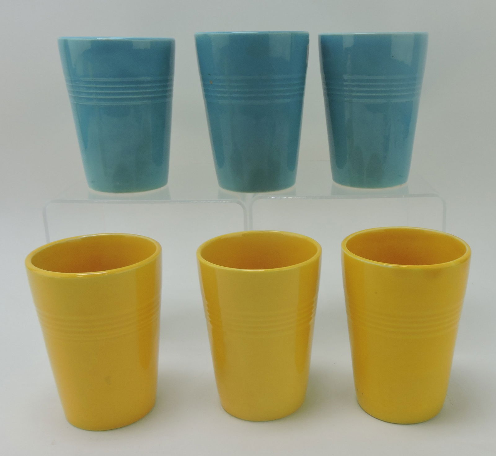 Harlequin tumbler group, 3 yellow,: 3 turquoise
