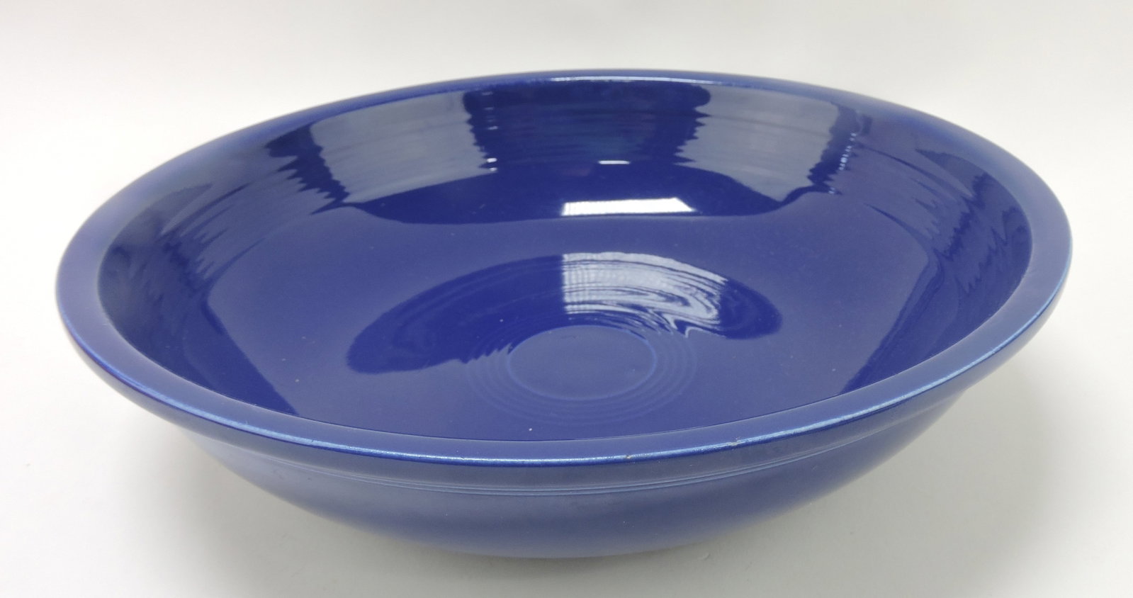 Fiesta 11 3/4" fruit bowl, cobalt, nick: .