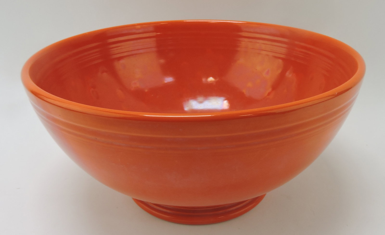 Fiesta footed salad bowl, red, minor nick: .