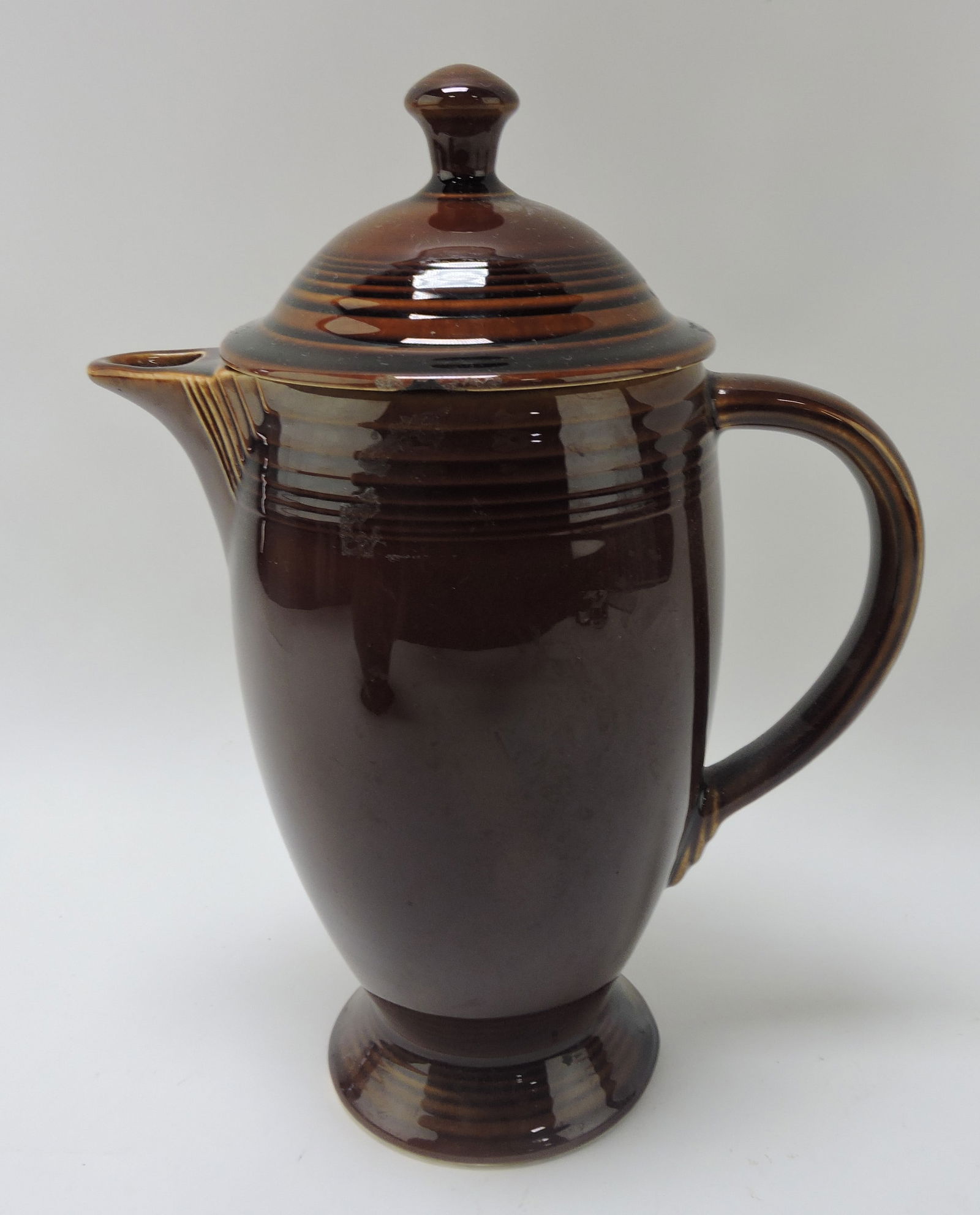 Fiesta Amberstone coffee pot, rim chip to (1 of 1)