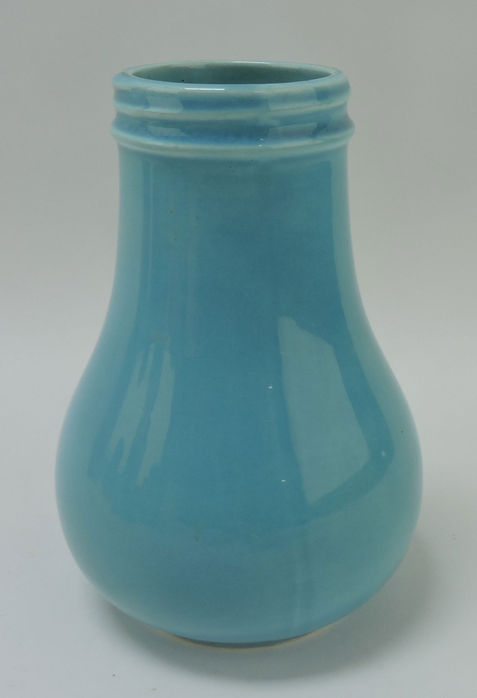 Fiesta syrup pitcher, turquoise, base only (1 of 1)