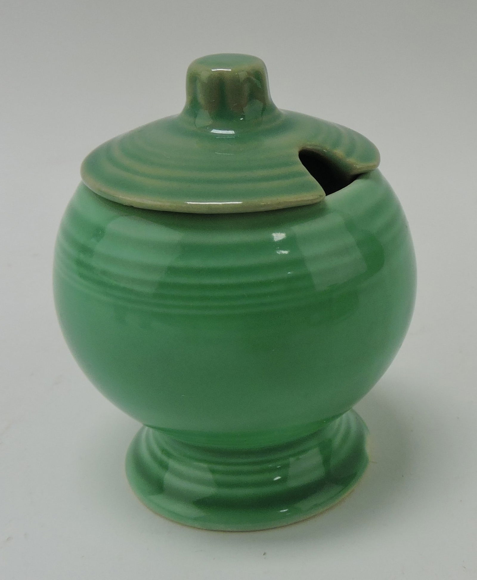 Fiesta mustard, green, minor rim nick: to lid