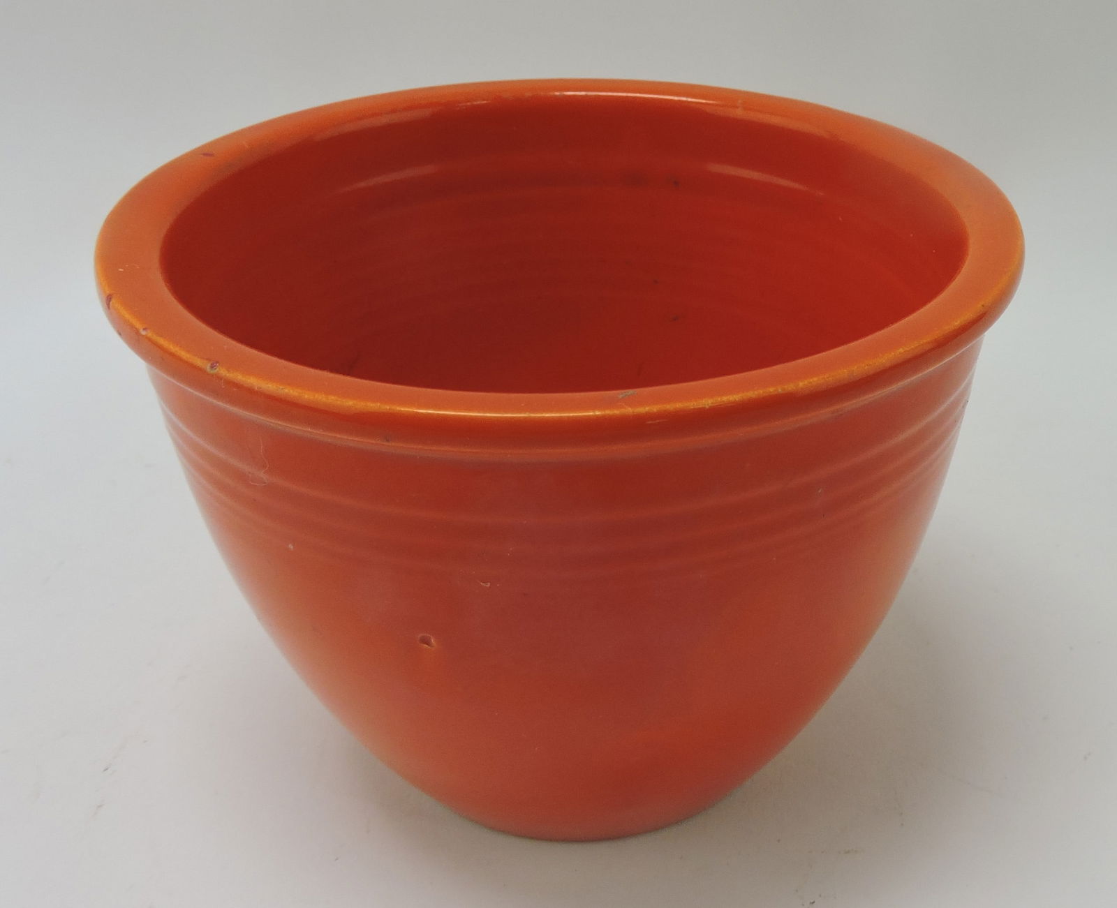 Fiesta #1 mixing bowl, red, rim nick (1 of 1)
