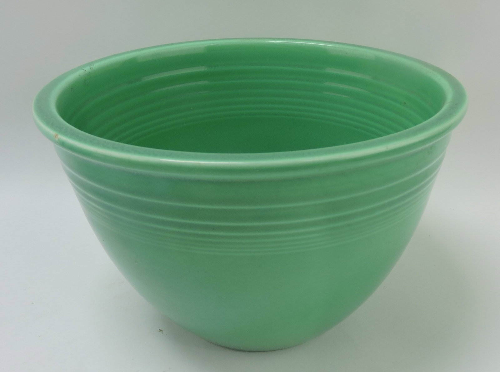 Fiesta #5 mixing bowl, green, inside rings,: rim nick
