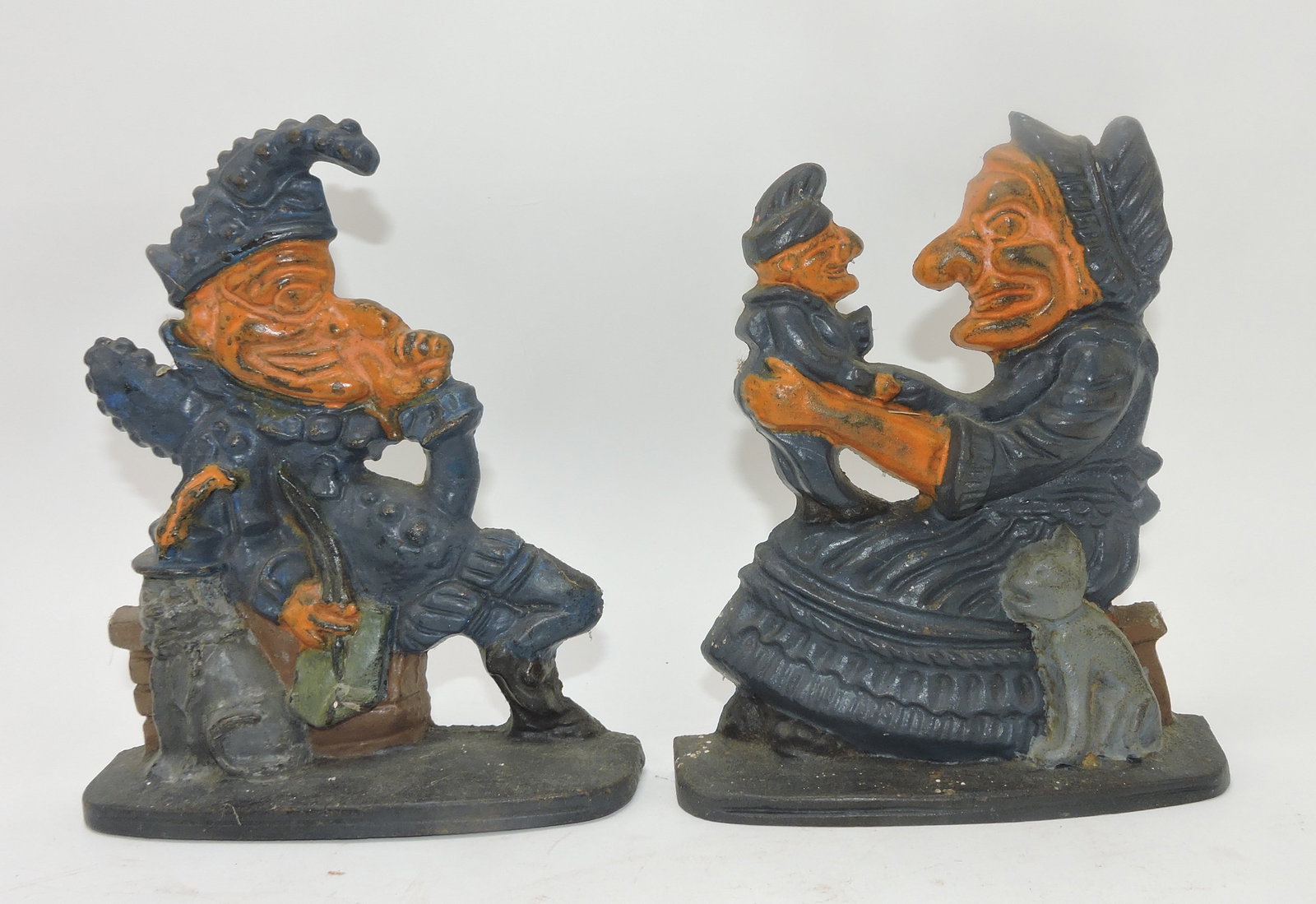 Cast iron 'Punch & Judy' door stop, 7": .