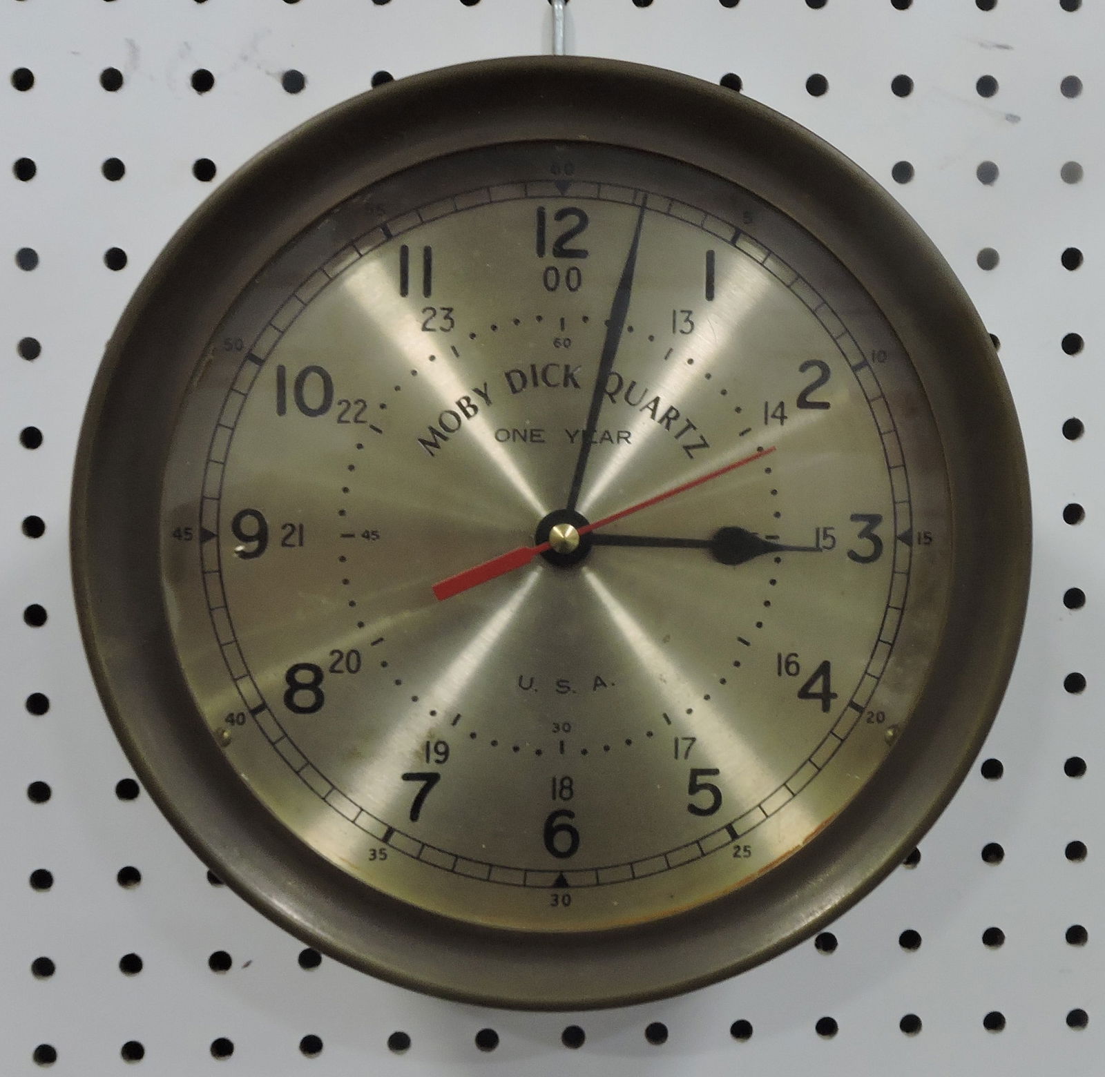 Moby Dick Quartz brass porthole: clock, 9 1/2"