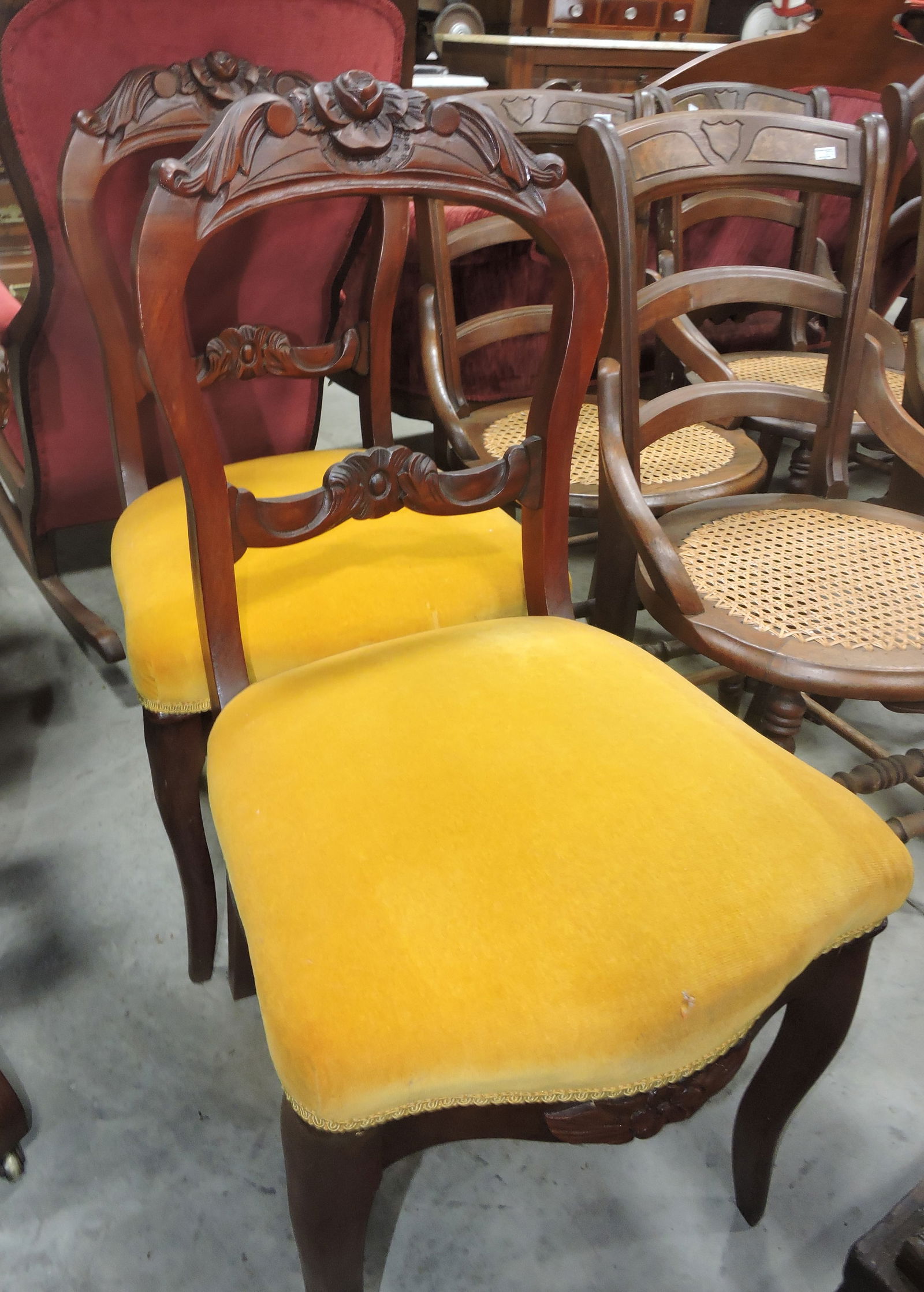 Walnut pair of dining chairs with rose (1 of 1)