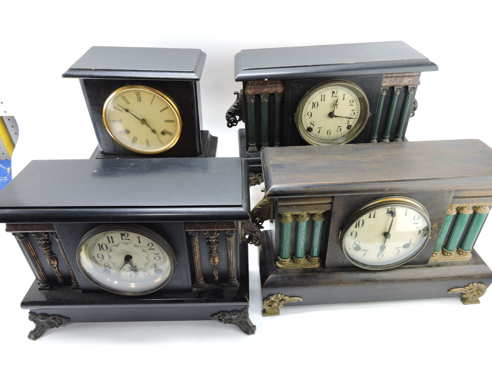 Lot of 4 black mantle clocks, various (1 of 1)