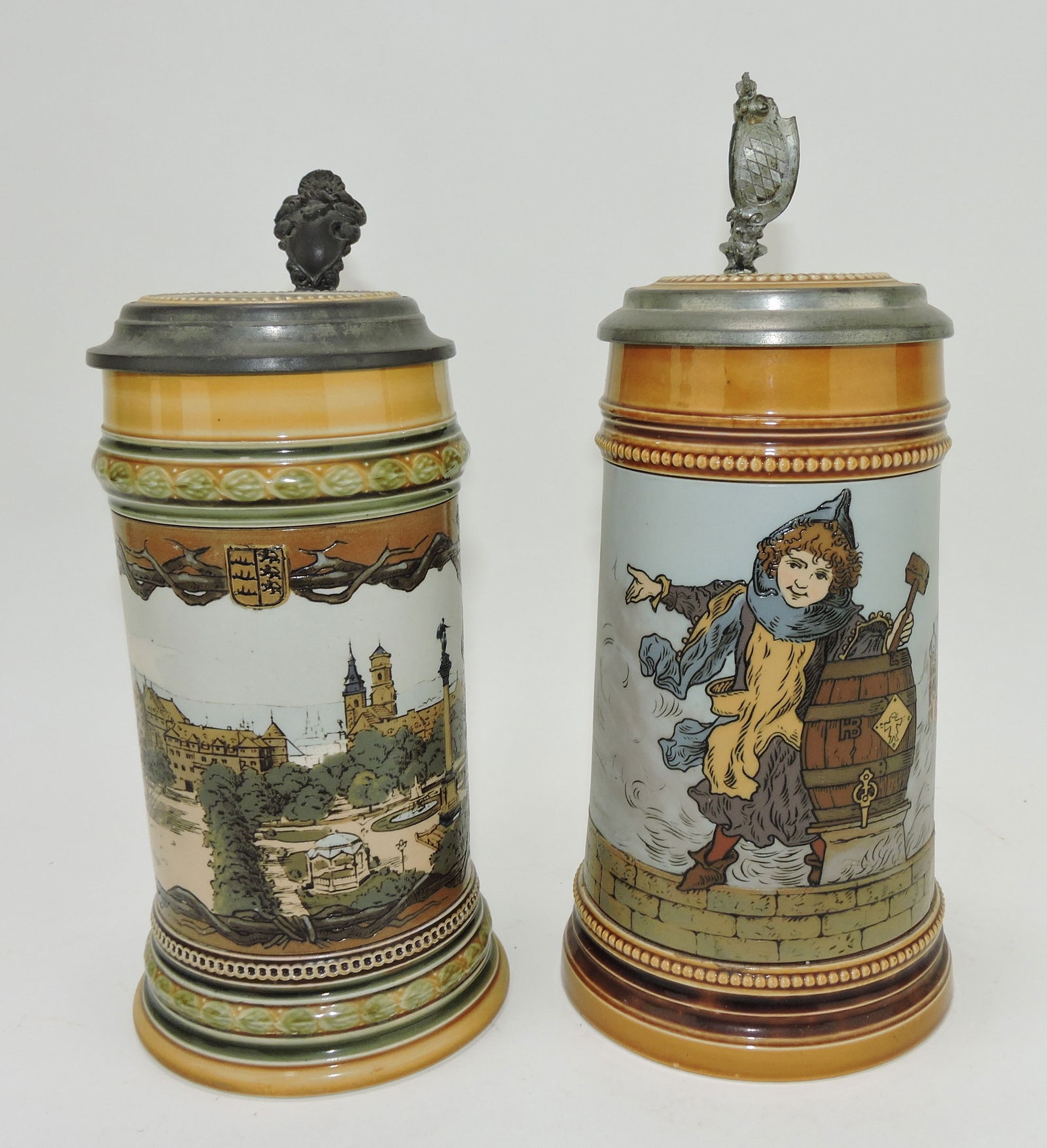 Mettlach lot of 2 steins, #1863 1/2"L, (1 of 3)