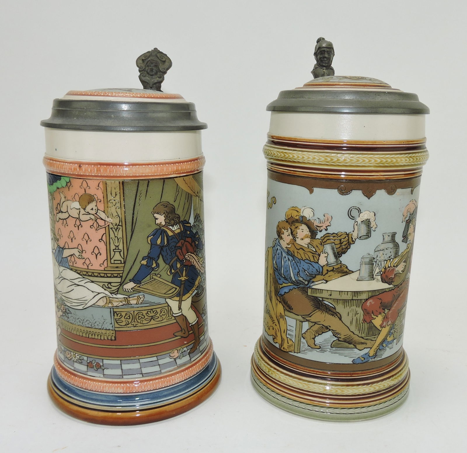 Mettlach lot of 2 steins, #2401 1/2"L, (1 of 3)
