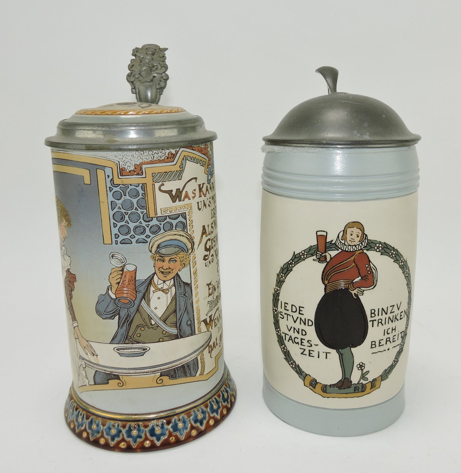 Mettlach lot of 2 steins, #2520 1L,: student drinking AND #3004 1L, man toasting