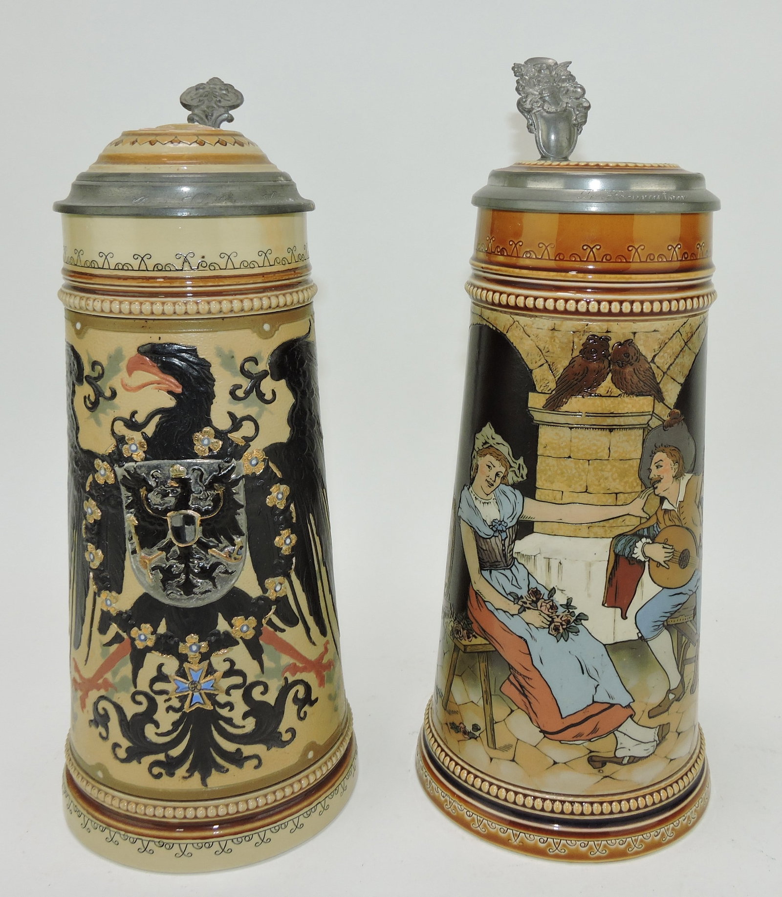 Mettlach lot of 2 steins, #2204 1L,: Prussian eagle AND #2780 1L, couple in wine cellar