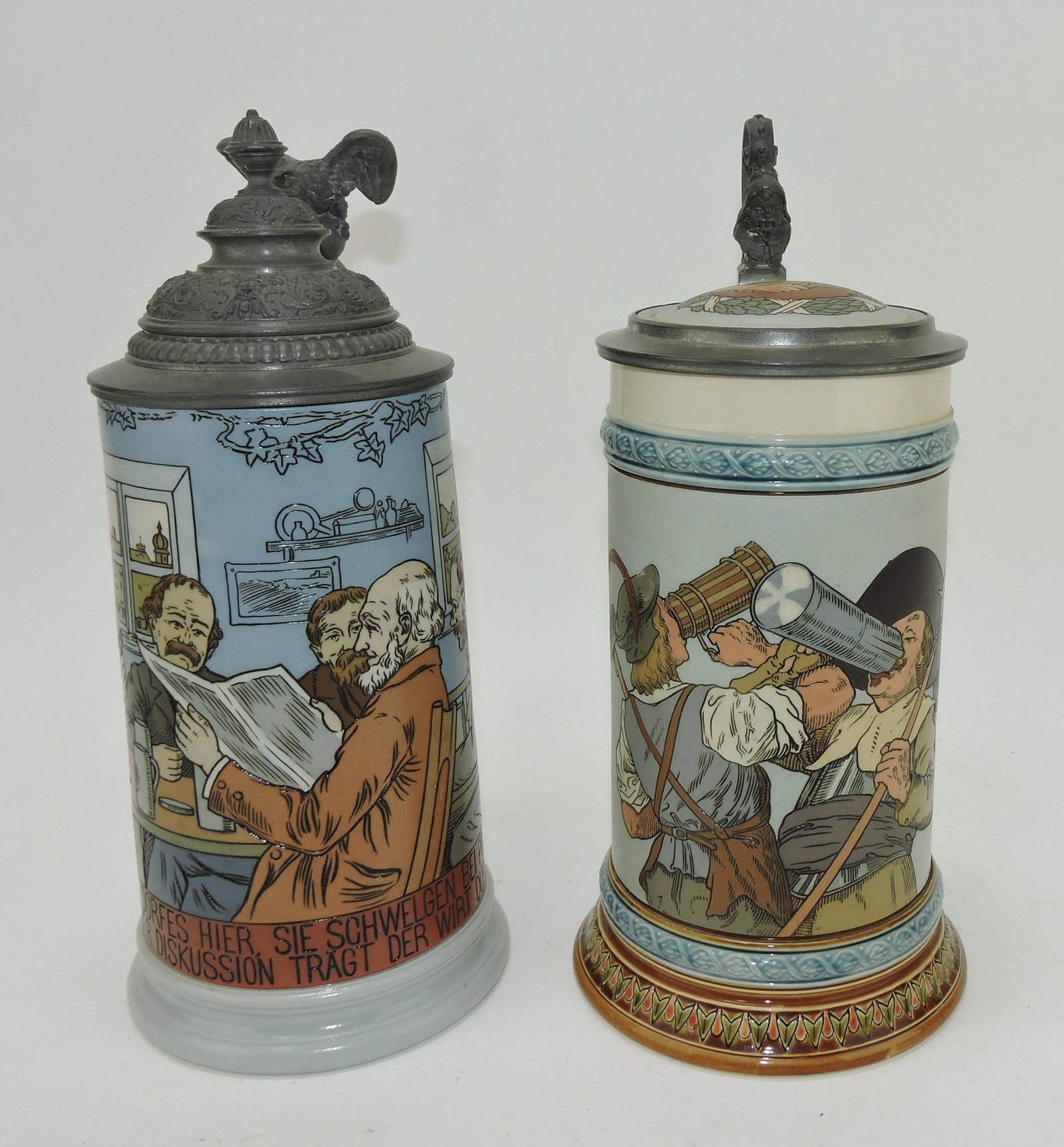 Mettlach lot of 2 steins, #2886 1L,: men reading AND #2639 1L, warriors drinking