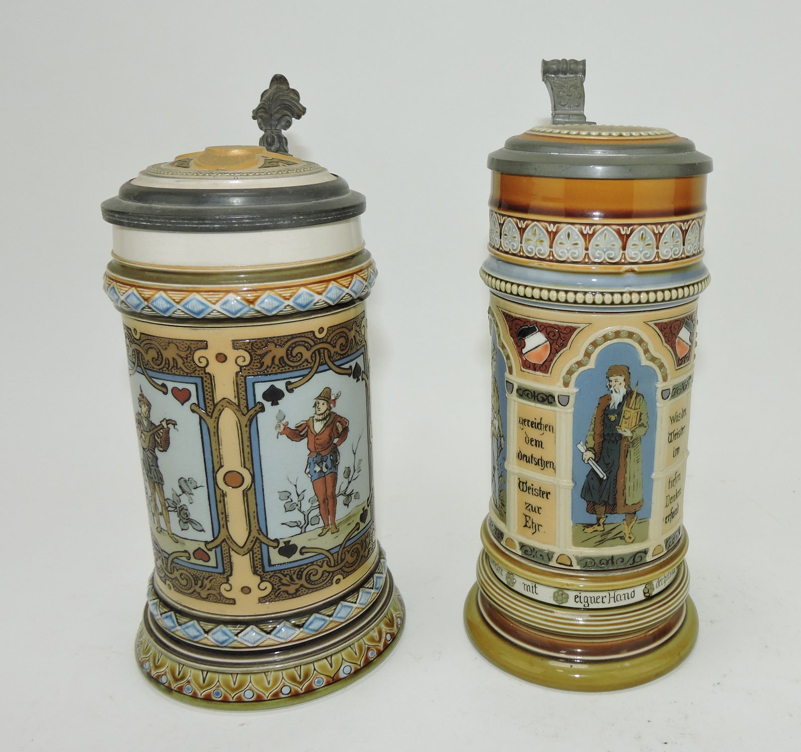 Mettlach lot of 2 steins, #1797 1/2L,: cards/coins on lid AND #1379 1/2L architects