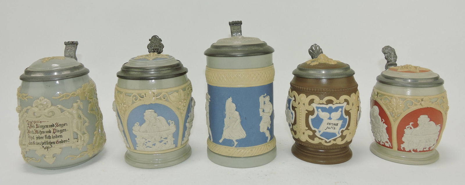 Mettlach lot of 5 steins, 1/4L & 1/2L, (1 of 3)