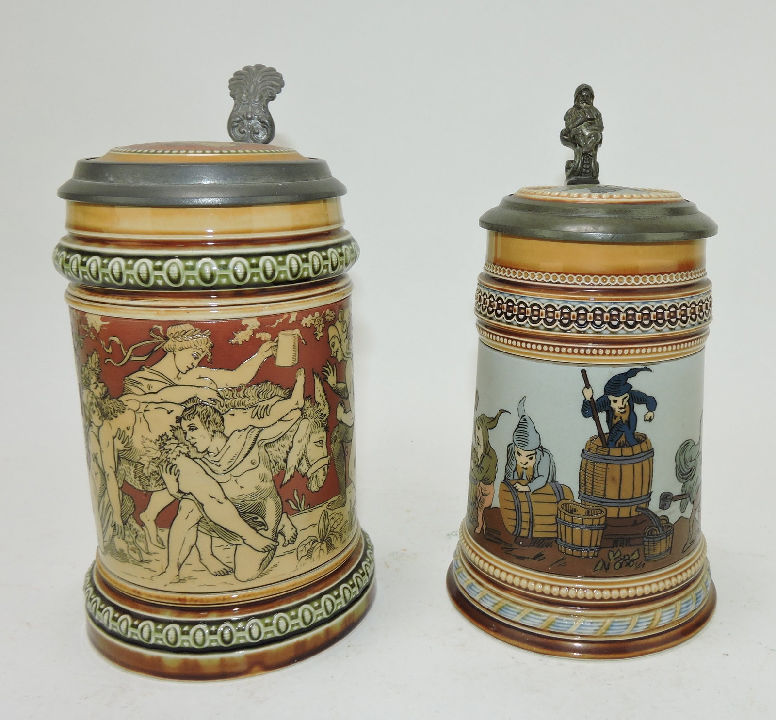 Mettlach lot of 2 steins, #2035 1/2L,: Bacchus AND #1478 1/2L, dwarfs making wine