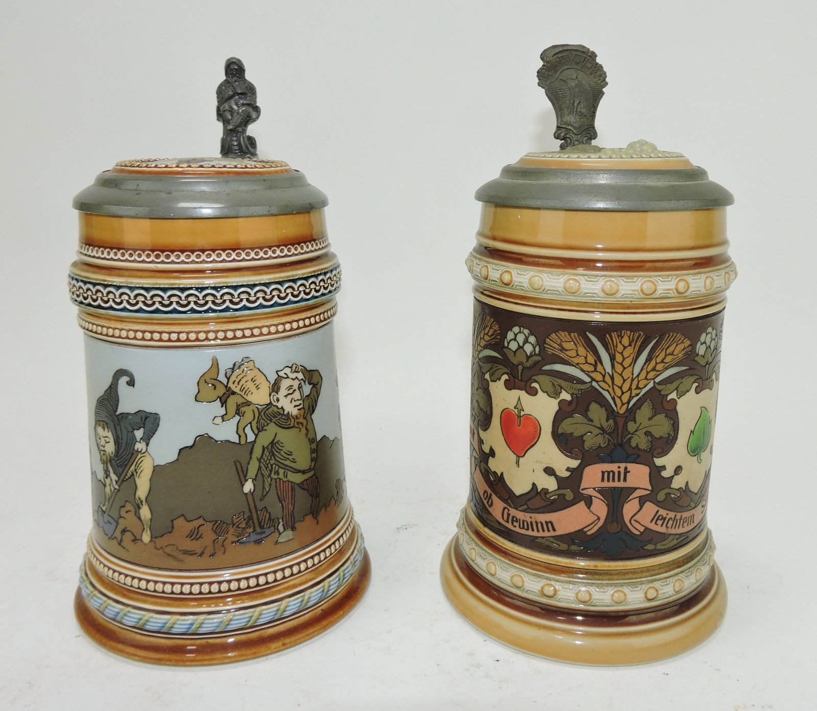 Mettlach lot of 2 steins, #1475 1/2L,: gnomes in vineyard AND #1394 1/2L, suites of cards