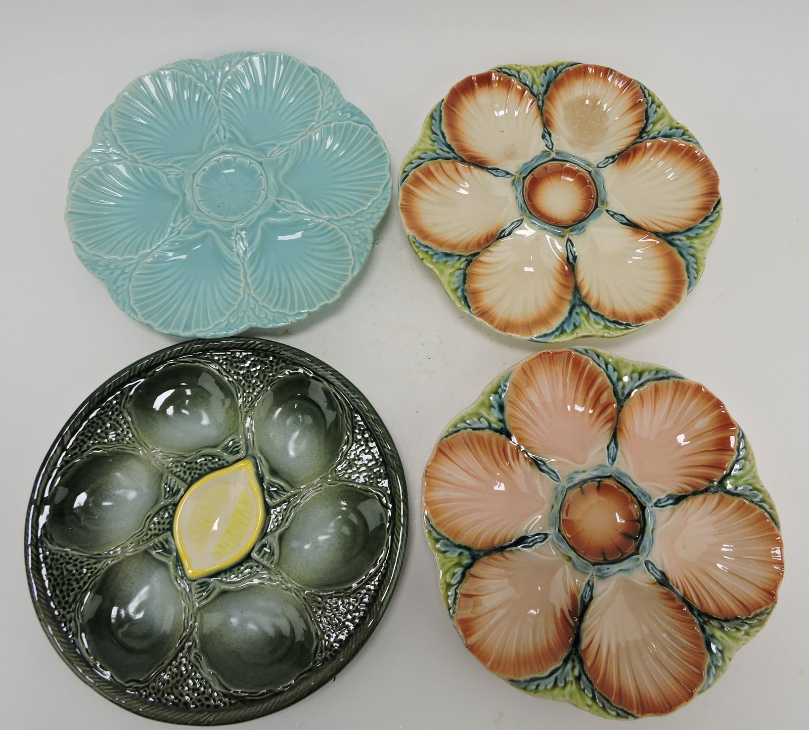 Majolica lot of 4 oyster plates: .