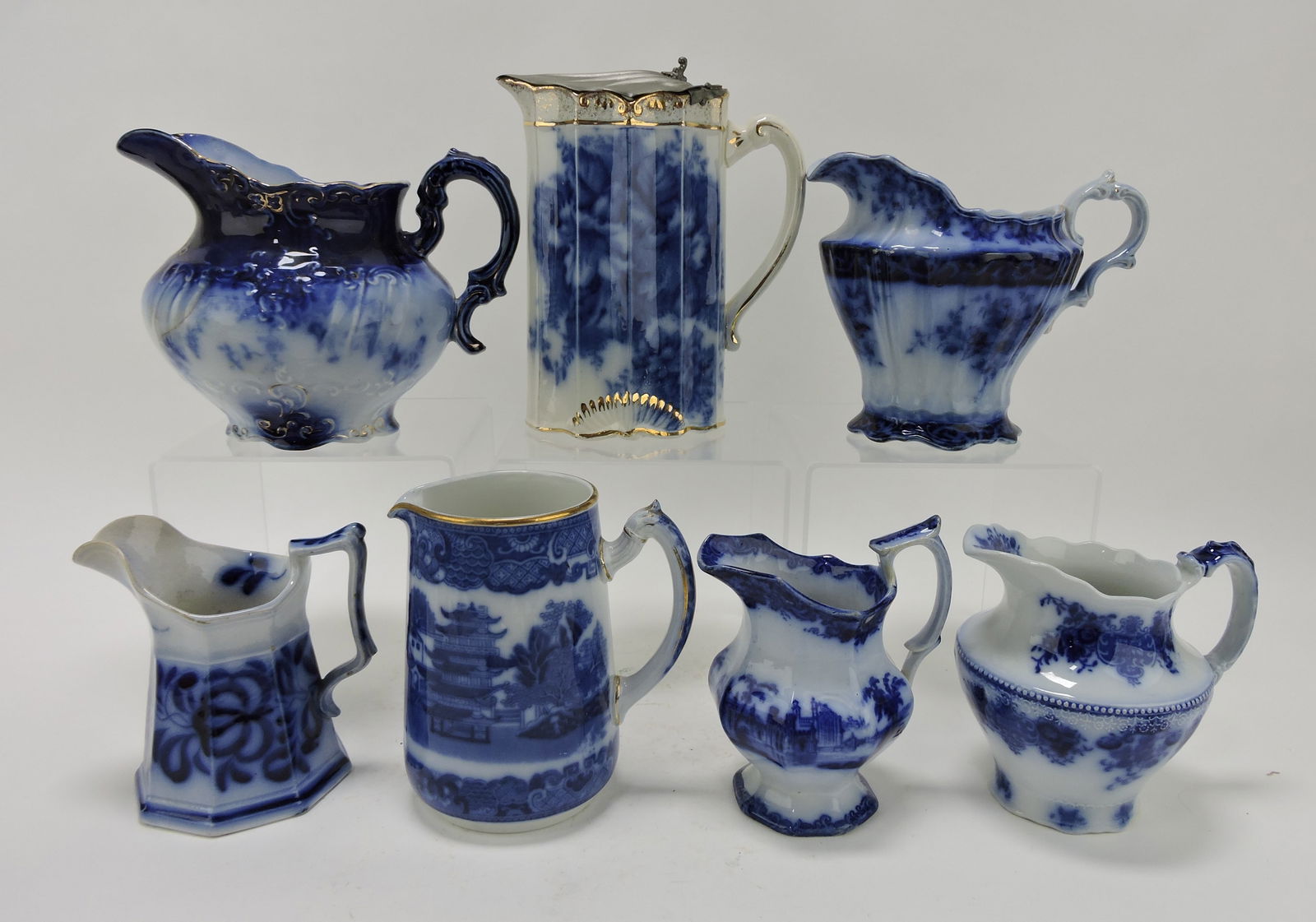 Flow Blue lot of 7 pitchers & creamers, (1 of 1)